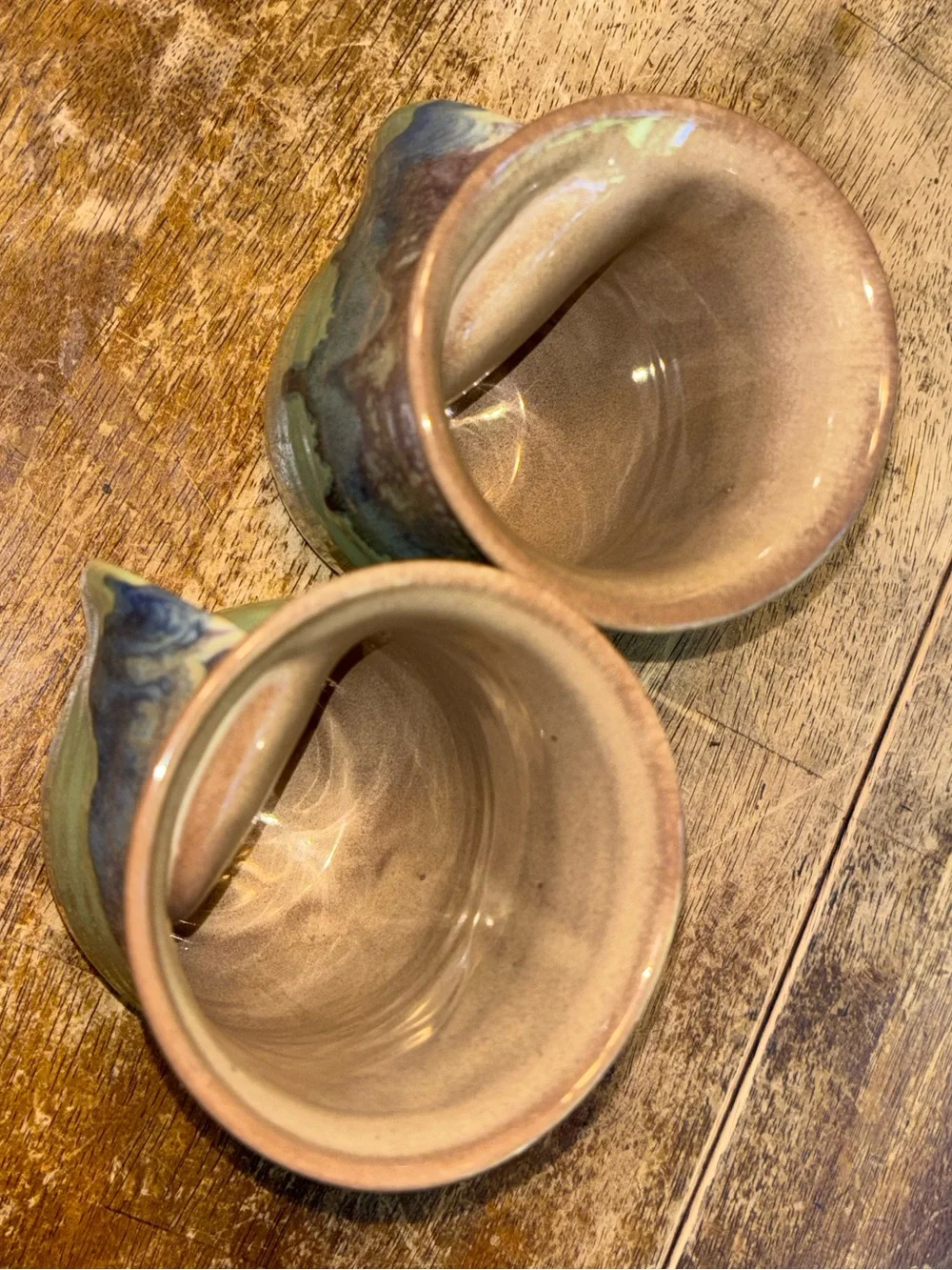 2013 & 2017 Neher Clay in Motion Mossy Creek Pottery Hand Warmer Mugs - Set of 2